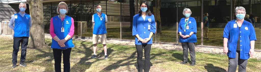 volunteers standing outside the hospital